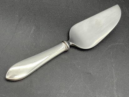 TIFFANY & CO STERLING SILVER SERRATED CHEESE KNIFE: TIFFANY & CO STERLING SILVER SERRATED CHEESE SERVER KNIFE-54 GRAMS-VERY GOOD CONDITION WEAR CONSISTENT WITH AGE -DP3422