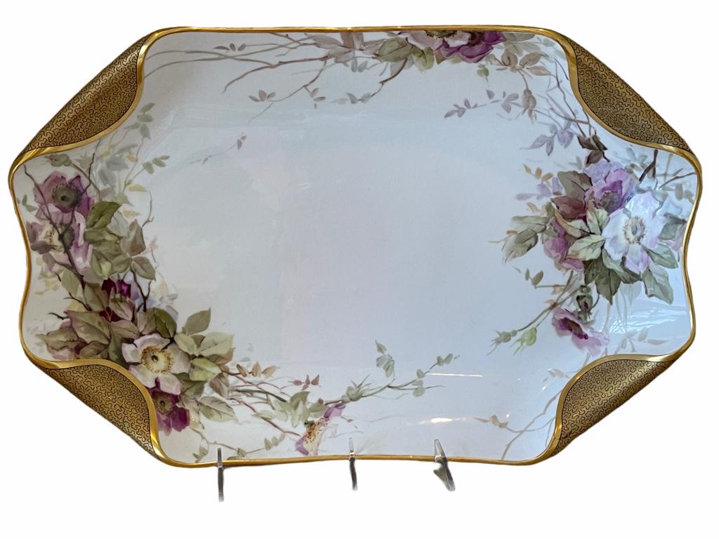 ANTIQUE H & C LIMOGES SIGNED OMW 1892 PLATTER: ANTIQUE H & C LIMOGES SIGNED OMW 1892 PLATTER -ELEGANT FLORAL MOTIF WITH GOLD ACCENTSVery good condition. THIS ITEM IS LOCATED OFF-SITE. All items must be picked up by appointment on Friday, April 15t