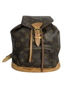 LOUIS VUITTON MOUNTSOURIS BROWN MONOGRAM CANVAS BG: LOUIS VUITTON MOUNTSOURIS BROWN MONOGRAM CANVAS BG- Brown Monogram Canvas Bag w/Vachetta Strap and Golden Brass Hardware- 9.8"L 10.6"H 3.9"W- Good Condition- AAN4035