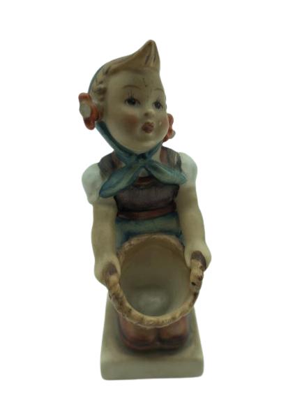 GOEBEL HUMMEL FIGURINE LITTLE HELPER FIGURINE 4.5": VINTAGE GOEBEL HUMMEL FIGURINE LITTLE HELPER GIRL WITH BUSHEL BASKET-4.5" -W GERMANYVERY GOOD OVERALL CONDITION WEAR CONSISTENT WITH AGE, SEE ALL PHOTOS-DP42122