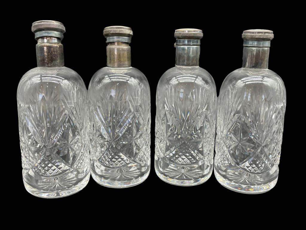 4 CLEAR CUT CRYSTAL COCKTAIL BITTERS BOTTLES: SET OF 4 VINTAGE CLEAR CUT CRYSTAL COCKTAIL BITTERS WITH SILVER TOPS | COLLECTIBLE BARWARE -7" HEIGHT EACH-VERY GOOD OVERALL CONDITION WEAR CONSISTENT WITH AGE AND USE, SEE ALL PHOTOS (NOT TESTED FOR 