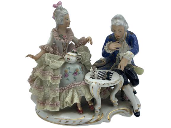 VINTAGE DRESDEN MAN AND LADY PLAYING CHESS: VINTAGE DRESDEN MAN AND WOMAN PLAYING CHESS- Hand Painted Porcelain Figurine- Used Condition Consistent with Age and Use (See Photos)- Note: Broken Dress Lace and 2 Missing Fingers (Lady) & 1 Missing
