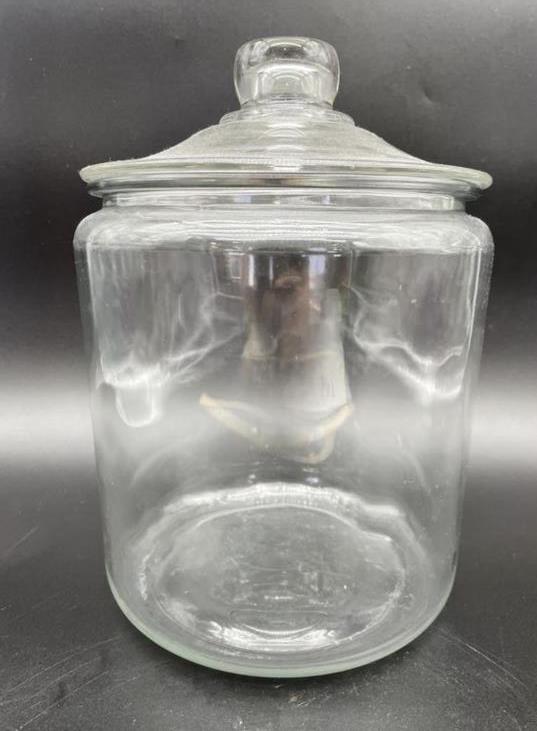 CRYSTAL CLEAR GLASS COOKIE JAR DISPLAY 7.5": CRYSTAL CLEAR GLASS COOKIE JAR DISPLAY 2 OF 2 -7.5" X 6.5" APPROX-VERY GOOD OVERALL CONDITION WEAR CONSISTENT WITH AGE AND USE, SEE ALL PHOTOS-DP42922