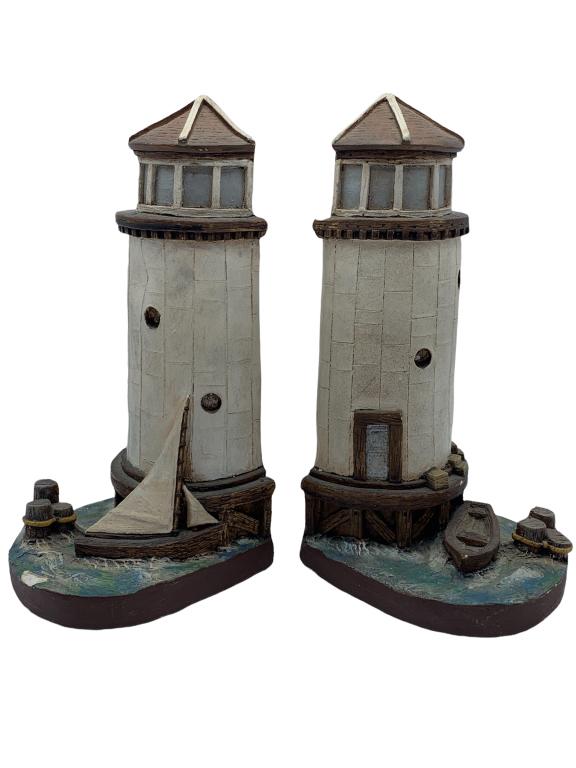 STAINMASTER NAUTICAL PAINTED LIGHTHOUSE BOOKENDS: STAINMASTER NAUTICAL PAINTED LIGHTHOUSE BOOKENDS- Cast Resin Construction- Good Pre-Owned Condition Wear Consistent with Age and Use (See Photos)- Chip on Bottom Edge of 1 Bookend (See Photos) - JB513