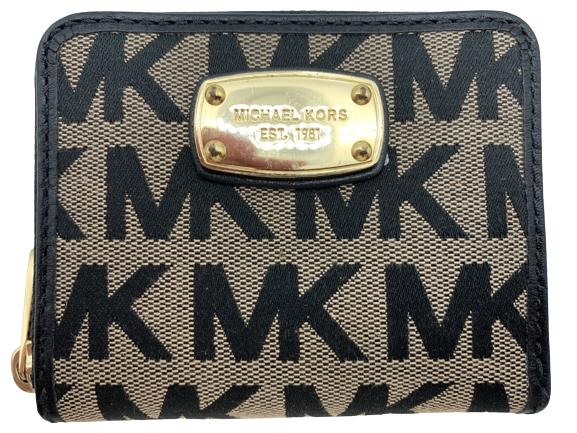 NEW MICHAEL KORS ZIP AROUND COIN WALLET: NEW MICHAEL KORS ZIP AROUND COIN WALLET- VERY GOOD CONDITION WEAR CONSISTENT WITH AGE (SEE PHOTOS)- JB061622 THIRD PARTY SHIPPING OR LOCAL PICKUP REQUIRED ON ALL ITEMS. A list of shippers can be found