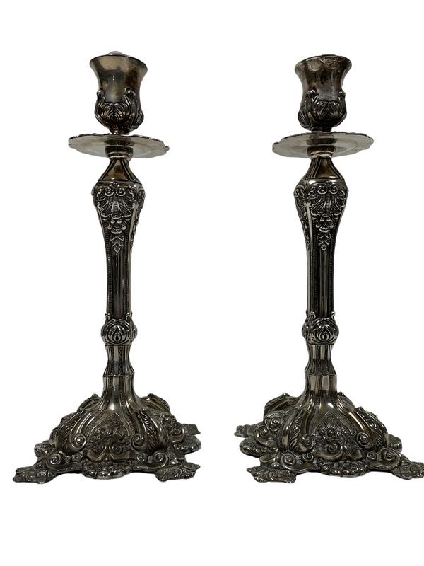 PAIR OF WALLACE STYLE SILVERPLATE CANDLESTICKS 12": PAIR OF WALLACE STYLE SILVERPLATE CANDLESTICKS | TABLEWARE TABLE ACCESSORIES NOUVEAU REGENCY STYLE-12" X 5" X 5" APPROX-VERY GOOD PRE OWNED CONDITION THIRD PARTY SHIPPING REQUIRED ON ALL ITEMS. A list
