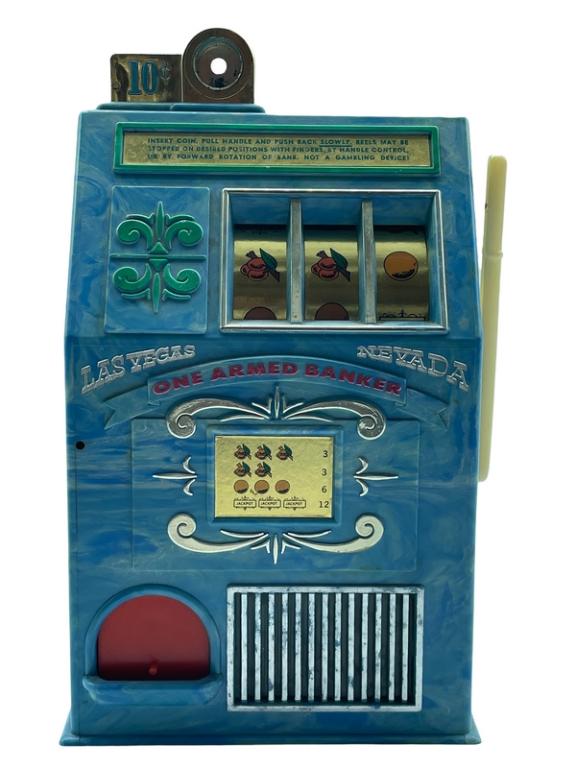 70'S ONE ARMED BANKER VEGAS TOY SLOT MACHINE 10.5": VTG 1970'S ONE ARMED BANKER LAS VEGAS NEVADA 10 CENT TOY SLOT MACHINE BANK | COLLECTIBLE TOYS SIN CITY SLOTS-10.5" H APPROX-GOOD PRE OWNED CONDITION, WEAR CONSISTENT WITH AGE AND LIGHT USE-DP62222 THI