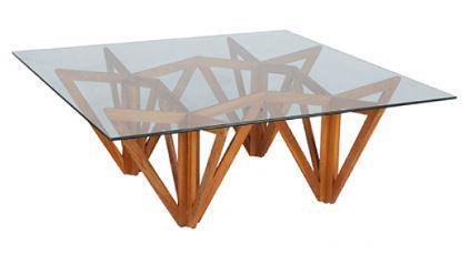 MODERN LAVINA WOOD SYMMETRICAL LEG COFFEE TABLE: LAVINA WOOD SYMMETRICAL LEG COFFEE TABLE | MODERN GEOMETRIC FURNITURE ASIAN CHINOISERIE HOME DECOR-1 OF 3-14" X 36" X 36" APPROX TO BASE-39.5" X 39.5" TO GLASS TOP -VERY GOOD CONDITION-WOOD COLOR VARI