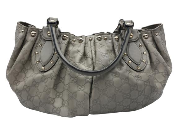 GUCCI STUDDED MONOGRAMMED PELHAM TOTE: Gucci Studded Pelham Tote- Ivory Calf Leather & Guccissima Leather- Ivory Leather Straps- Gold Hardware- 31*28*12cm- 206719-467891ALL BAGS HAVE BEEN AUTHENTICATED - AAT3523