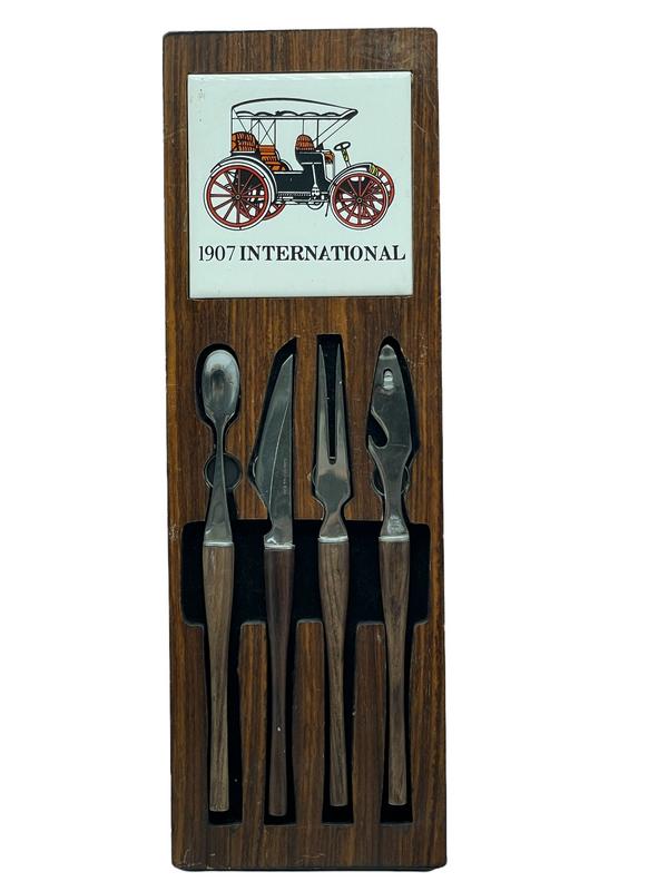1907 INTERNATIONAL WALL HANGING BAR TOOL SET 16": VINTAGE MID CENTURY 1907 INTERNATIONAL WALL HANGING WOOD & TILE BARTENDER TOOL SET WITH MAGNETS TO HOLD TOOLS IN PLACE-16" X 5" APPROX-GOOD PRE OWNED CONDITION, WEAR TO WOOD AND TOOLS CONSISTENT WITH 