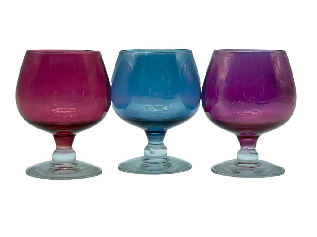 SET OF 3 MID CENTURY MULTI COLORED BRANDY SNIFTERS: SET OF 3 MID CENTURY MULTI COLORED BRANDY SNIFTERS | COLLECTIBLE MID MOD RETRO BARWARE GLASSWARE-2.75" APPROX EACH-PRE OWNED CONDITION, MARKS CONSISTENT WITH AGE AND LIGHT USE, SMALL CHIP TO BASE OF 1