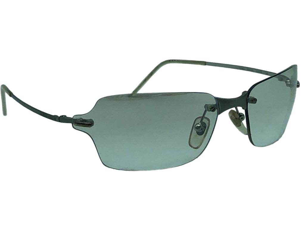VINTAGE GIORGIO ARMANI FRAMELESS SUNGLASSES: VINTAGE GIORGIO ARMANI FRAMELESS SUNGLASSES -GOOD OVERALL CONDITION-CASE HAS WEAR DUE TO AGE AND USE