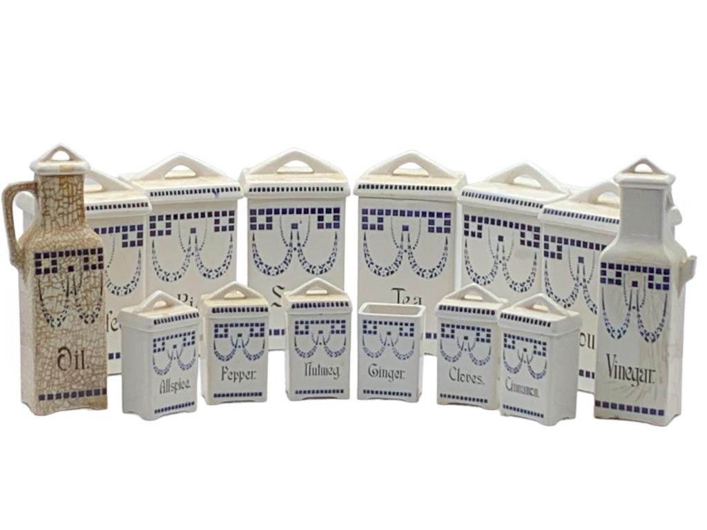 VTG L.R. GERMANY CERMIC KITCHEN CANISTER SET: -VTG L.R. GERMANY CERMIC KITCHEN CANISTER SET -14 PIECE SET-MAKERS MARK ON BOTTOM-MINOR DAMAAGE TO VINEGAR CONTAINER HANDLE-MISSING ON LID-SEE ALL PHOTOSJR 10/4