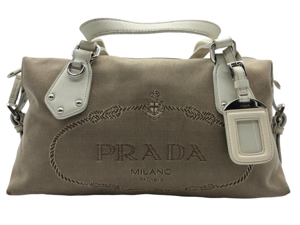 PRADA BIG LOGO CANVAS HANDBAG: PRADA BIG LOGOHANDBAG'- BEIGE CANVAS -CANVAS FABRIC -32*20*16CM- ALL BAGS HAVE BEEN AUTHENTICATED BOX 3 EAG7190