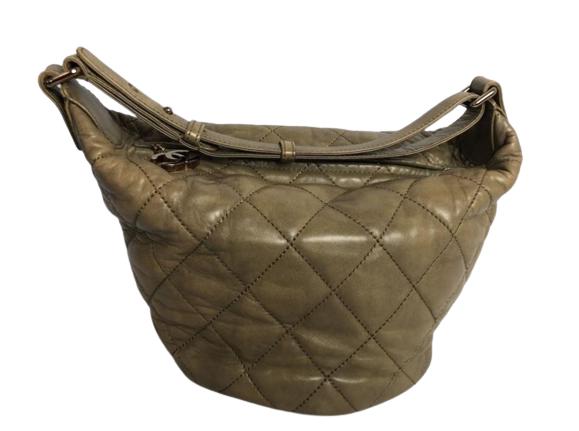 CHANEL ZIP HOBO DARK BEIGE SHOULDER BAG: CHANEL ZIP HOBO DARK BEIGE SHOULDER BAG- Quilted Leather w/ Beige Leather Strap and BronzeHardware- 15.0"L 9.4"H 6.9 "W- Good Condition.- AAN4078