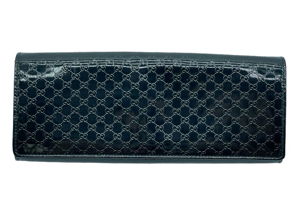 GUCCI BLACK PATENT LEATHER BROADWAY CLUTCH: GUCCI BLACK PATENT LEATHER BROADWAY CLUTCH MICROGUSSIMA -10" X 4" APPROX-GOOD PRE OWNED CONDITION-DP31523