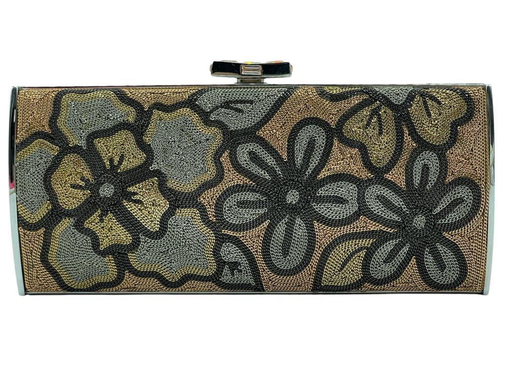 VINTAGE JUDITH LEIBER FLOWER CLUTCH: VINTAGE JUDITH LEIBER FLOWER CLUTCH-ORIGINAL TAG FROM NEIMAN MARCUS 3395.00-WITH MIRROR AND STRAP-VERY GOOD PRE OWNED CONDITION-DP31523