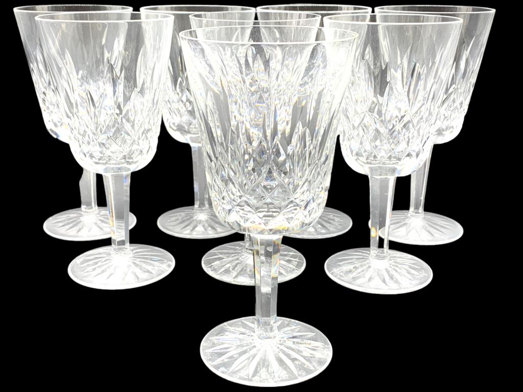 8 WATERFORD CRYSTAL LISMORE WINE GLASSES 8": 8 WATERFORD CRYSTAL LISMORE WINE GLASSES 8"-VERY GOOD PREOWNED CONDITION THIS ITEM IS LOCATED OFF-SITE. All items off-site must be picked up by confirmed online appointment on TUESDAY, MARCH 28th, or 