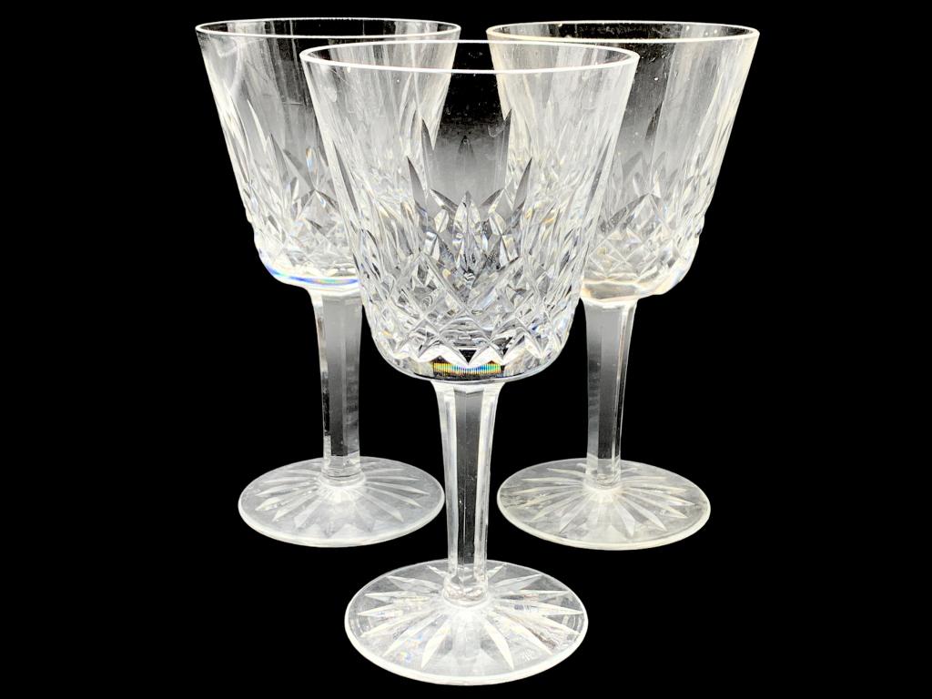 3 WATERFORD CRYSTAL LISMORE WINE GLASSES 5 3/4": 3WATERFORD CRYSTAL LISMORE WINE GLASSES 5 3/4" -VERY GOOD PREOWNED CONDITION THIS ITEM IS LOCATED OFF-SITE. All items off-site must be picked up by confirmed online appointment on TUESDAY, MARCH 28th,