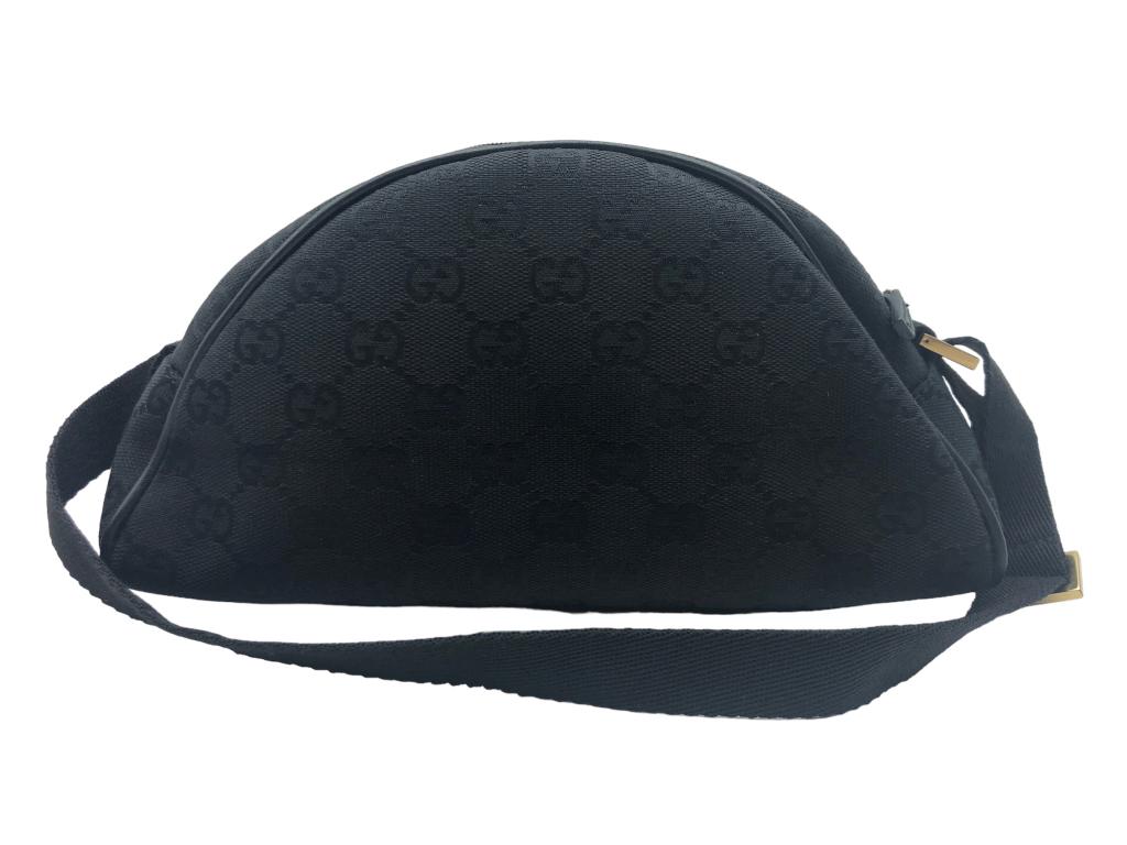 GUCCI SMALL MONOGRAMMED BLACK CANVAS POCHETTE (1 of 4)