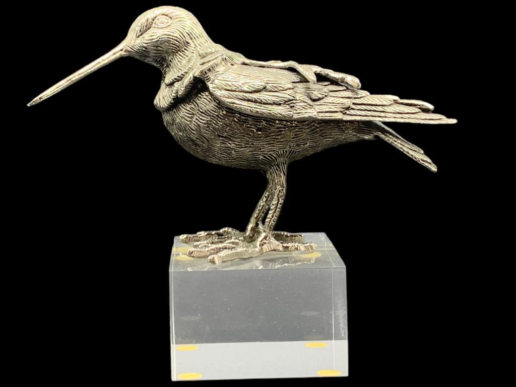 VTG METAL BIRD SCULPTURE ON LUCITE BASE 7.5": -VTG METAL BIRD SCULPTURE MOUNTED ON LUCITE BASE-SIZE: 3.5" X 7.5" JR BTQ 04/003