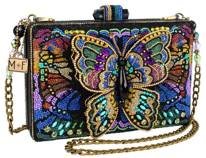 NEW MARY FRANCES KALIDOSCOPE CROSSBODY HANDBAG: -NEW MARY FRANCES KALIDOSCOPE CROSSBODY HANDBAG -A true kaleidoscope of colors and textures take flight in this handbag that features a 3-dimensional butterfly as the centerpiece.Dimensions: 8.5 x 2 x
