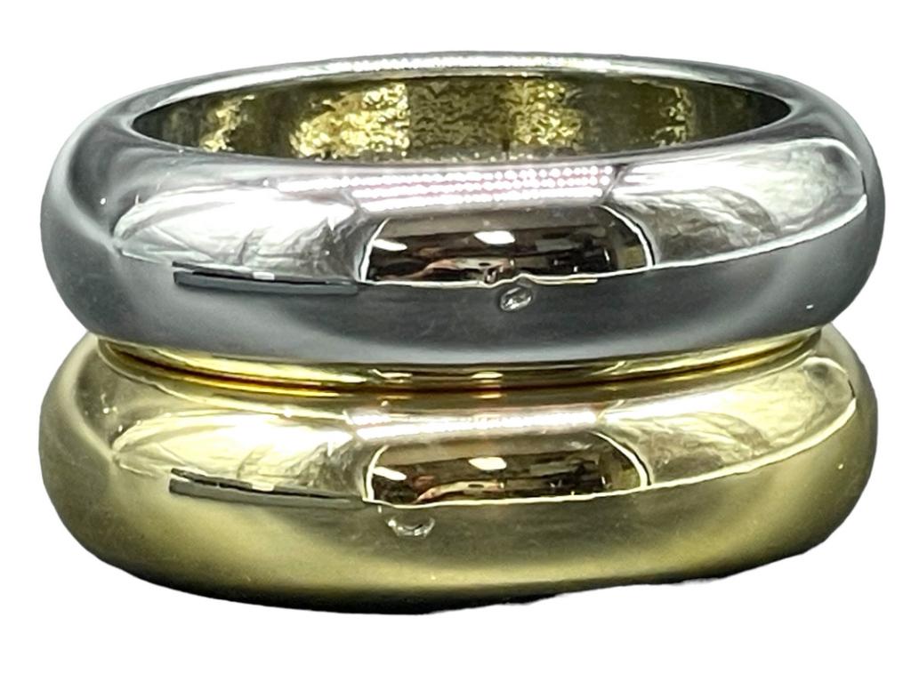 PAIR OF SILVER AND GOLD MODERN CUFF BRACELETS: PAIR OF SILVER AND GOLD MODERN CUFF BRACELETS-GOOD PRE OWNED CONDITION, MINOR WEAR-DP61523