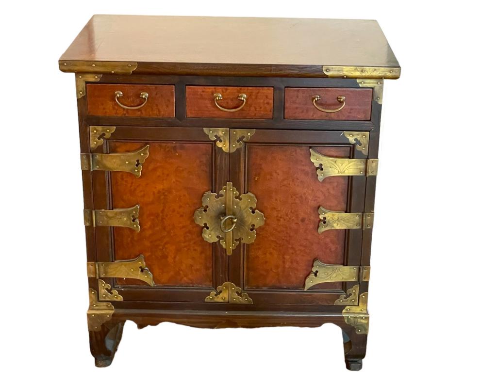 VINTAGE KOREAN BRASS TRIMMED SIDE CHEST 25": EARLY 20C. VINTAGE KOREAN BRASS TRIMMED SIDE CHEST WITH LOCK-25" X 23" X 14" APPROX-GOOD PRE OWNED CONDITION-DP72723