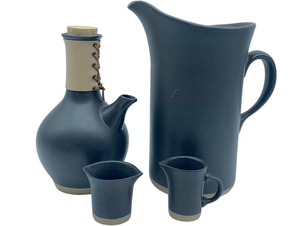 VTG MARSHALL STUDIOS LEATHER WRAPPED CERAMIC SET: VINTAGE MARSHALL STUDIOS LEATHER CERAMIC PITCHER, LEATHER WRAPPED CARAFE AND CUP SET-12" HEIGHT TO PITCHER-SIGNED JANE AND GORDON MARTZ-very GOOD PRE OWNED CONDITION, -NO CHIPS OR CRACKS-JR RL GLRY 08