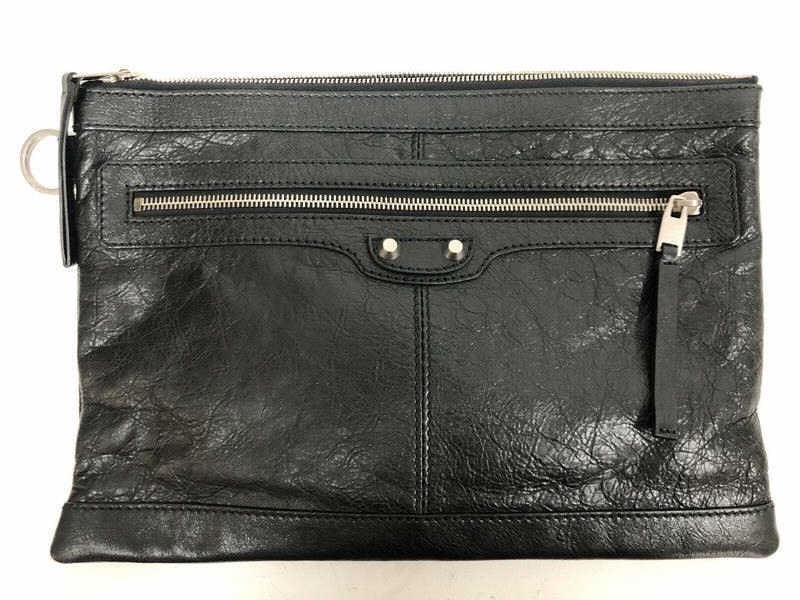 BALENCIAGA BLACK LEATHER CLIP M HANDBAG: -Balenciaga Classic Clip M Handbag -Black Calf LeatherDistressed Leather & Brushed Silver Hardware -32*22* Condition Rating AA. Box AAP254 Please be advised that by placing a bid, you are entering int