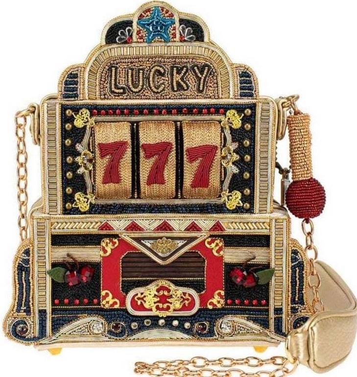 NEW! MARY FRANCES LUCKY 7 EMBELLISHED SLOT MACHING: NEW! MARY FRANCES LUCKY 7 EMBELLISHED SLOT MACHINE HANDBAG8 x 2.25 x 7"Strap Length End to End: 42"Strap Drop: 18.5"Non-removable padded-shoulder chain strap, magnet flap closure, inside slip pocket,
