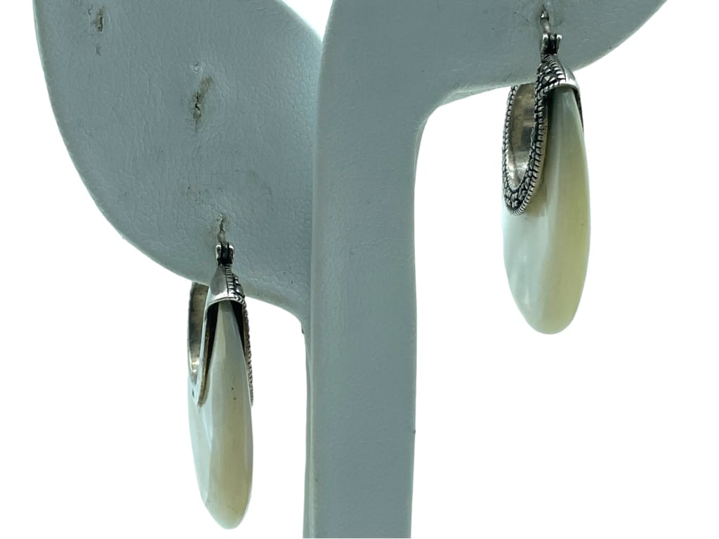 STERLING & MOTHER OF PEARL MARCASITE EARRINGS 16g: -STERLING & MOTHER OF PEARL MARCASITE EARRINGS -925 Sterling Silver Mother of Pearl Marcasite Hoop Earrings-GOOD CONDITION -TOTAL WEIGHT: 16g Bidders may pick up their items from the auction-house or 
