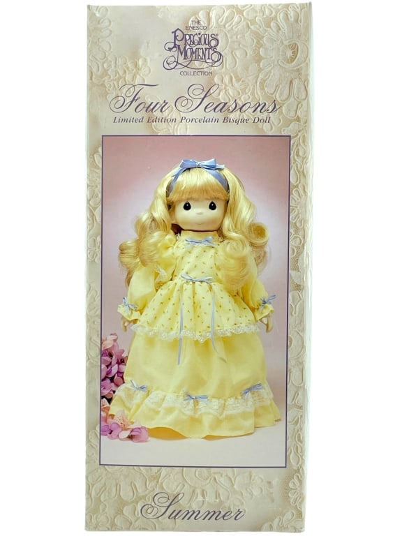 PRECIOUS MOMENTS FOUR SEASONS PORCELAIN DOLL 14": -PRECIOUS MOMENTS COLLECTION, FOUR SEASONS LIMITED EDITION PORCELAIN BISQUE "SUMMER" DOLL -SIZE: 14"H X 6"W-GOOD CONDITION IN ORIGINAL BOX -JR BTQ 10/26 Bidders may pick up their items from the auctio