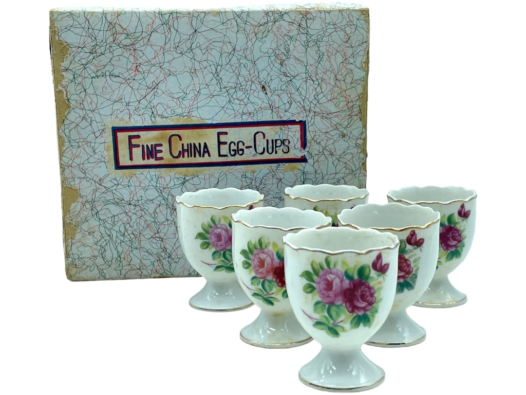 (6) VTG BONE CHINA PORCELAIN EGG CUPS: -(6) VTG BONE CHINA PORCELAIN EGG CUPS -SIZE: 2.25"T-GOOD PREOWNED CONDITION -IN ORIGINAL BOX-JR BTQ GLS CSE 11/17 Bidders may pick up their items from the auction-house or have their items shipped.Ap