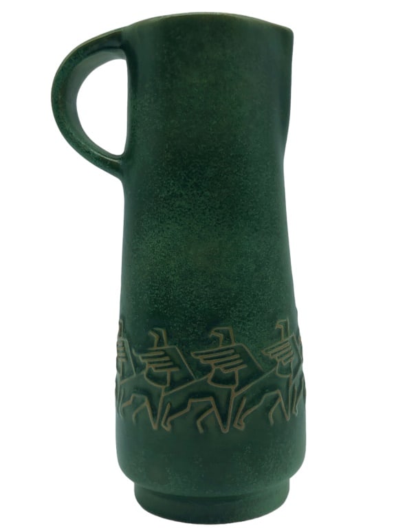 KARLSRUHER GREEN TRIBAL DESIGN WATER PITCHER 9": KARLSRUHER GREEN TRIBAL DESIGN WATER PITCHER-GOOD CONDITION, CERAMIC-SIZE: 9" X 3"-JR RL GLRY 11/08 Bidders may pick up their items from the auction-house or have their items shipped. Appointments are