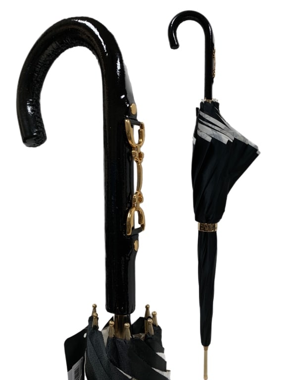 NEW PASOTTI ITALIAN LEATHER UMBRELLA 35": -PASOTTI ITALIAN DOG HEAD UMBRELLA WITH GOLD ACCENTS -LEGNTH: 35" -NEW-JR SR BAC COR 11/03