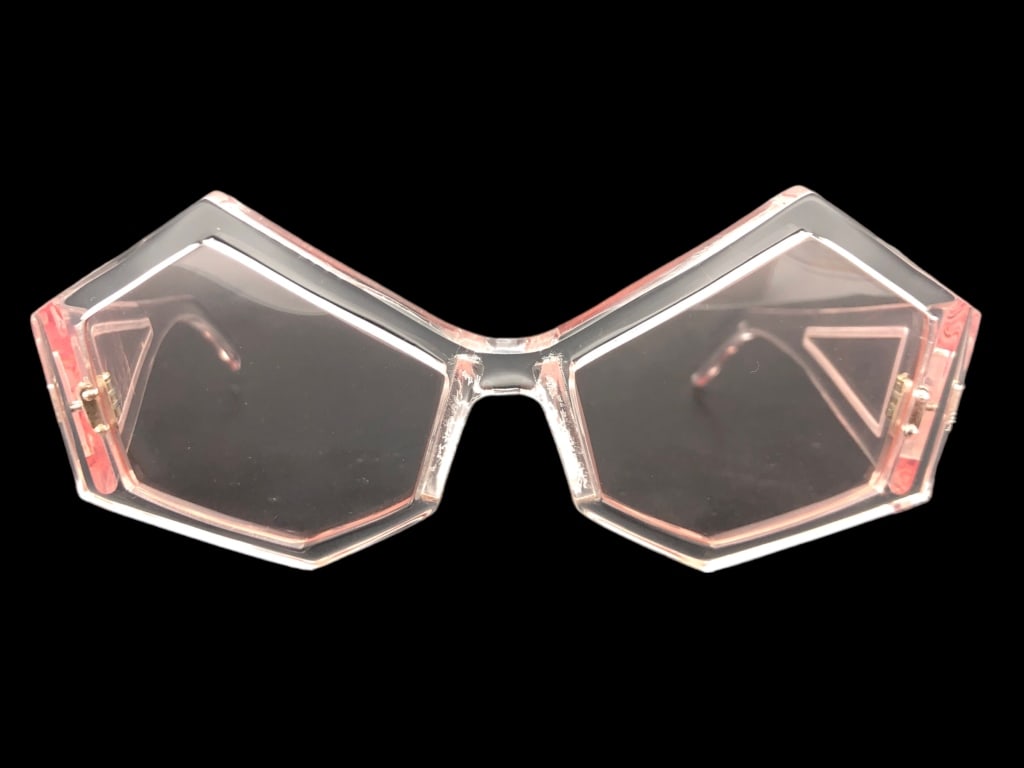 VINTAGE HOUSE OF FLORA TRANSPARENT SUNGLASSES: - VINTAGE HOUSE OF FLORA TRANSPARENT SUNGLASSES - DESIGNER- NEW WITH TAG | COMES WITH HOUSE OF FLORA SLEEVE- EXCELLENT CONDITION- GF 12/13/23 Bidders may pick up their items from the auction-house or 