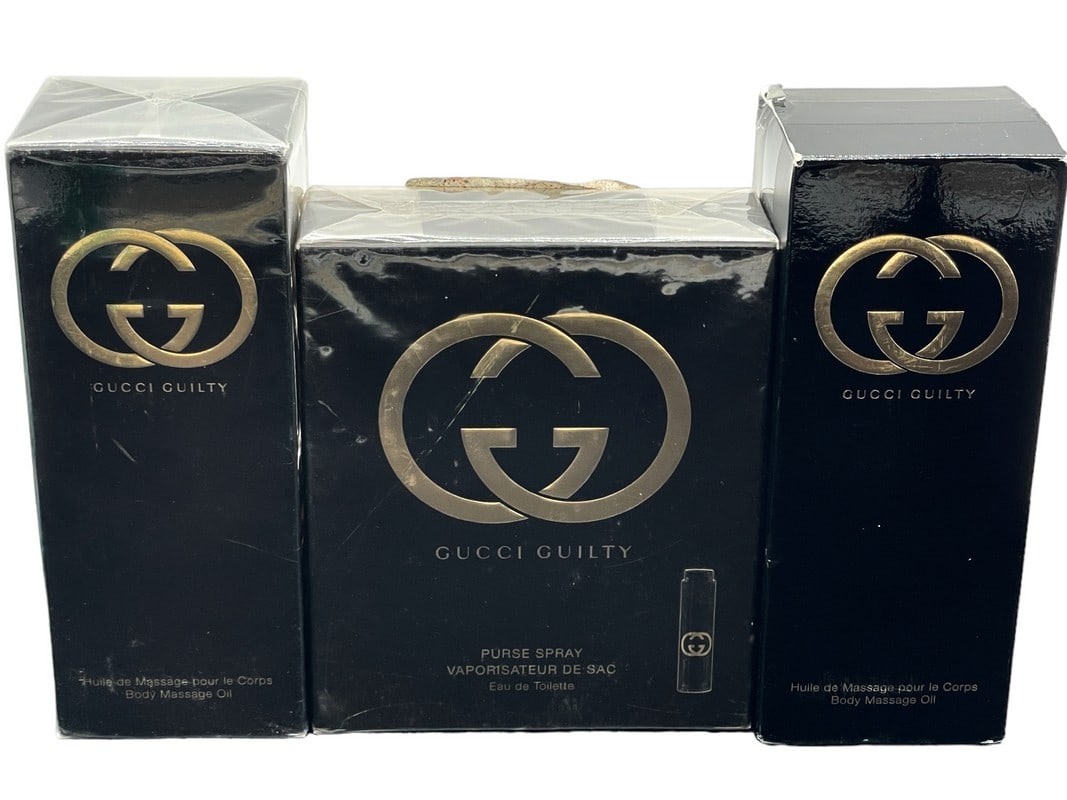 NEW! SET OF 3 GUCCI GUILTY FRAGRANCES: NEW!!! SET OF 3 GUCCI GUILTY FRAGRANCES-PURSE SPRAY -BODY MASSAGE OIL X2-NEW UNUSED CONDITION IN BOX-DP121823REG Bidders may pick up their items from the auction-house or have their items shipped.Appo
