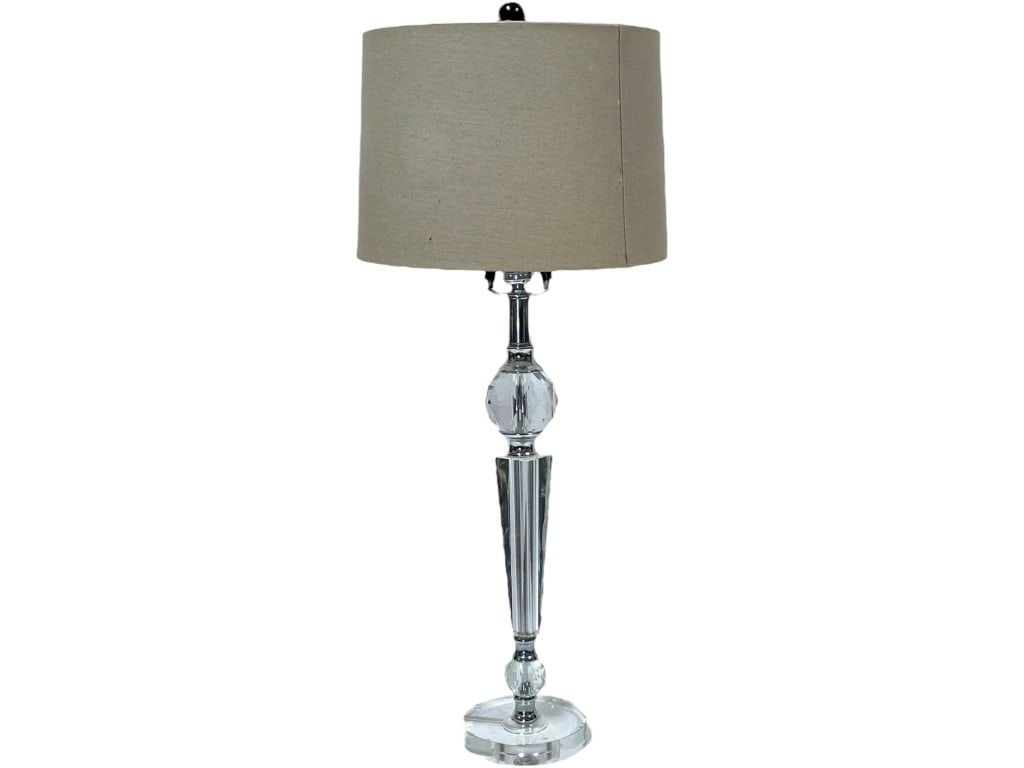 LUCITE LAMP WITH GLASS BASE 31": -LUCITE LAMP WITH GLASS BASE -SIZE: 31"H 5.5" BASE -PREOWNED CONDITION -SON CHIPS TO GLASS BASE SEE ALL PHOTOS Bidders may pick up their items from the auction-house or have their items shipped.Appoin