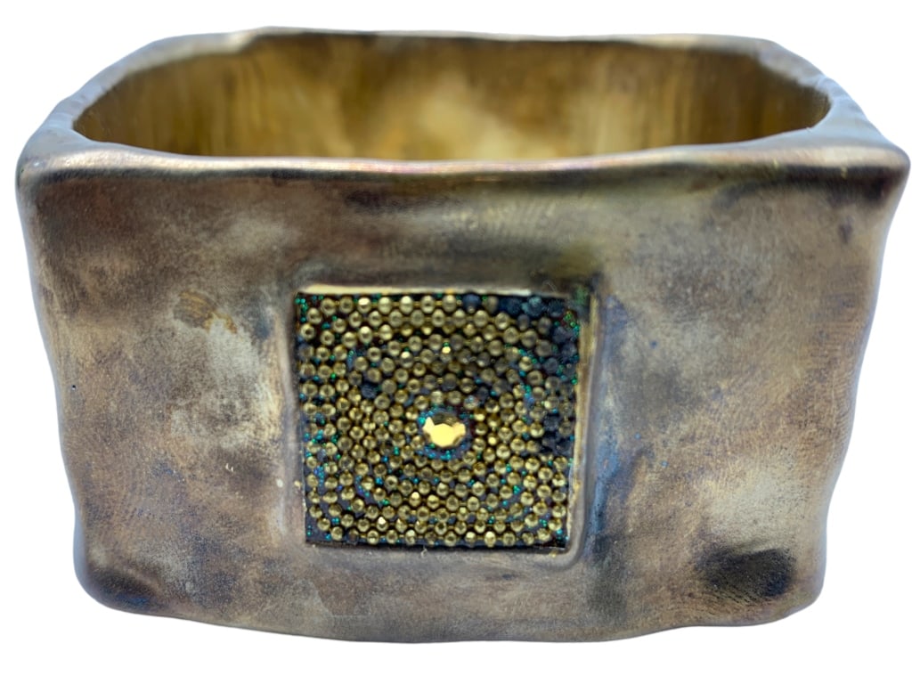 MODERN BRUTILIST BRACELET WITH SQUARE DESIGN: MODERN BRUTILIST BANGLE BRACELET WITH SQUARE DESIGN-SIZE: 3" INNER DIAMETER Bidders may pick up their items from the auction-house or have their items shipped. Appointments are required for local pick