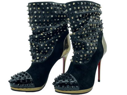 CHRISTIAN LOUBOUTIN SPIKED WARS ANKLE BOOTS: CHRISTIAN LOUBOUTIN SPIKED WARS ANKLE BOOTS -BLACK PATENT LEATHER AND SUEDE -SZ 36 1/2 Bidders may pick up their items from the auction-house or have their items shipped.Appointments are required for