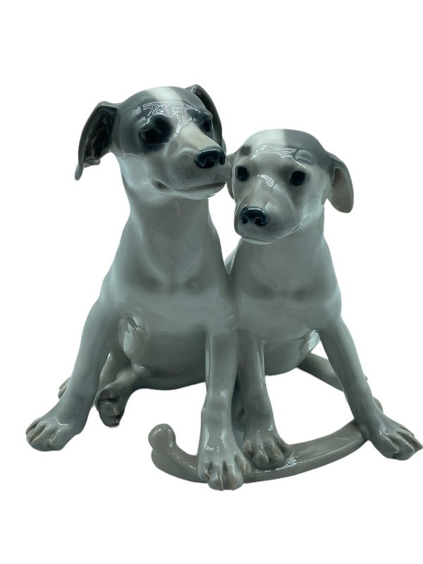ROYAL COPENHAGEN PAIR OF PUPPIES FIGURINE 9": ROYAL COPENHAGEN PAIR OF PUPPIES WITH BONE FIGURINE - NO. 1452 750 RC -9" HEIGHT APPROX-VERY GOOD CONDITION-DP4524ST Bidders may pick up their items from the auction-house or have their items shipped.
