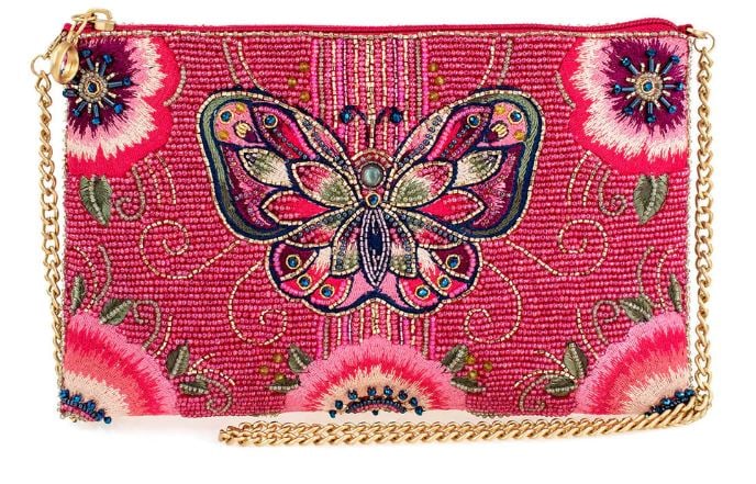 NEW MARY FRANCES SOCIAL BUTTERFLY CROSSBODY: NEW MARY FRANCES SOCIAL BUTTERFLY CROSSBODYFlutter into the scene with the 'Social Butterfly' mini crossbody handbag. This dazzling fusion of fashion and flight is adorned with a symphony of beads in 
