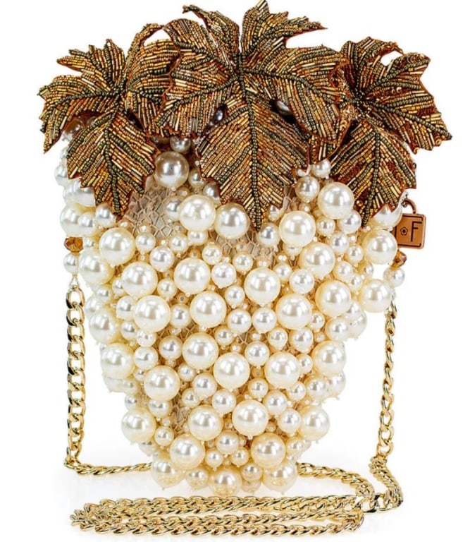 NEW MARY FRANCES GRAPES GALORE CROSSBODY HANDBAG: Grapes Galore is an enchanting creation, featuring a cascade of glossy pearls arranged to mimic a lush cluster of grapes. It's crowned with sparkling, hand-beaded 3D foliage that hangs from a gold cha
