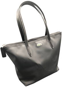 LACOSTE ZIP TOTE BAG -BLACK: LACOSTE ZIP TOTE BAG -BLACK -ZIPPER CLOSURE -SIZE 8"H-14"W -WEAR MARKS PRESENT ON BACK -DG0624 Bidders may pick up their items from the auction-house or have their items shipped. Some items qualify fo