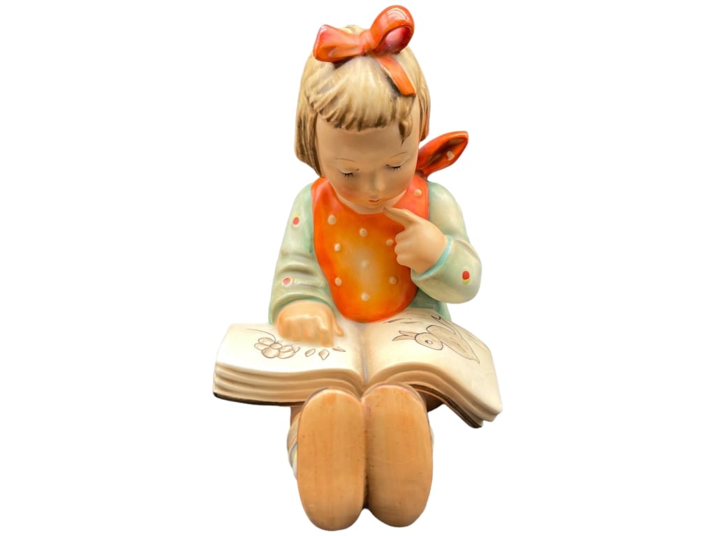 WESTERN GERMANY ANTIQUE GIRL READING BOOK: WESTERN GERMANY ANTIQUE GIRL READING BOOK -ITEM CONDITION VERY GOOD -MA062624Bidders may pick up their items from the auction-house or have their items shipped.Appointments are required for local pick