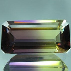 13.40 CT. PURPLE & GOLD BI-COLOR GEMSTONE $650