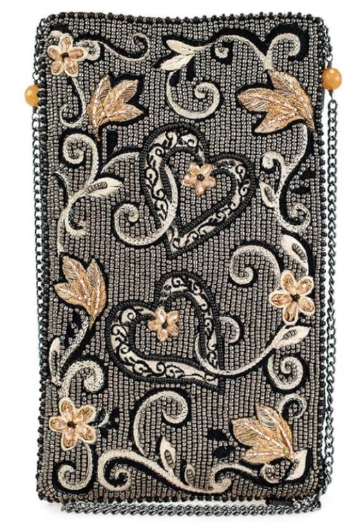 NEW MARY FRANCES HEARTSONG CROSSBODY HANDBAG: Say hello to the epitome of elegance with a twist of fun ? the Mary Frances Crossbody Phone Bag! This chic little number is adorned with an enchanting tapestry of black, pewter and soft peach beading,