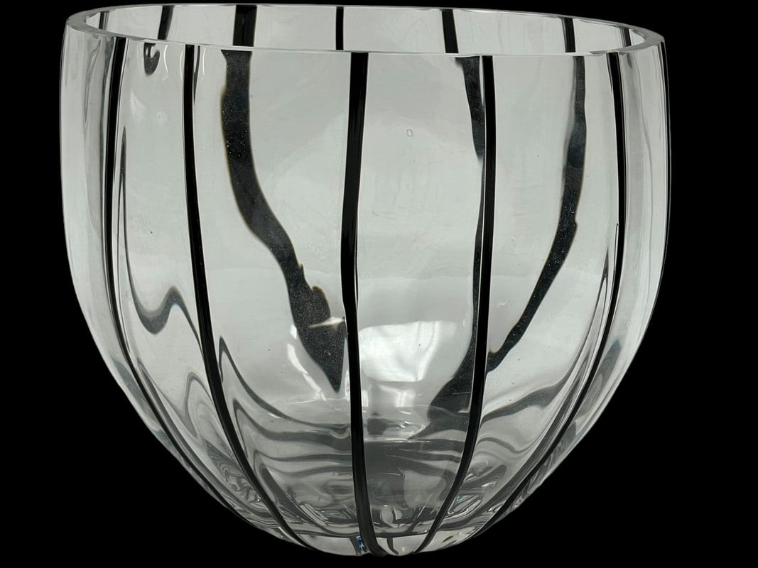 IRREGULARLY ROUNDED ART GLASS CENTERPIECE 9": IRREGULARLY ROUNDED ART GLASS CENTERPIECE WITH APPLIED THIN BANDS OF BLACK GLASS PASTE -8" X 9" DIAMETER APPROX -VERY GOOD PRE OWNED CONDITION -DP52324 Bidders may pick up their items from the 