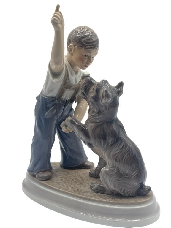 DAHL JENSEN COPENHAGEN "BOY WITH DOG AND SUGAR": DAHL JENSEN COPENHAGEN "BOY WITH DOG AND SUGAR" -VERY GOOD PREWONED CONDITION -#1206 -APROX 12"H X 9"L Bidders may pick up their items from the auction-house or have their items shipped. ***All